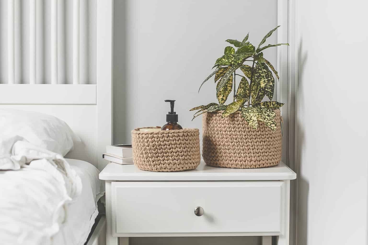 Scandinavian interior in white colors. Home plant in jute basket. Lifestyle authentic concept. scandinavian interior in white colors home plant i WW4EWLL
